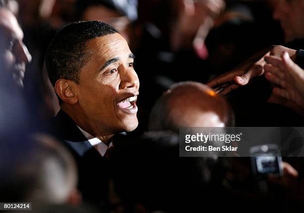 Democratic presidential hopeful Sen. Barack Obama greet supporters after speaking at a primary campaign rally outside the San Antonio Municipal...