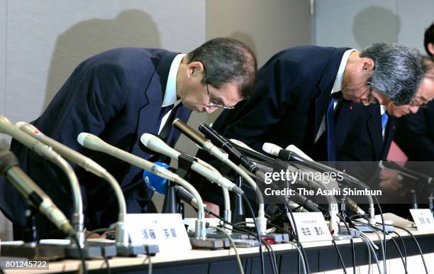 Air bag maker Takata CEO Shigehisa Takada bows at the end of a press conference on June 26, 2017 in Tokyo, Japan. The air bag maker filed the...