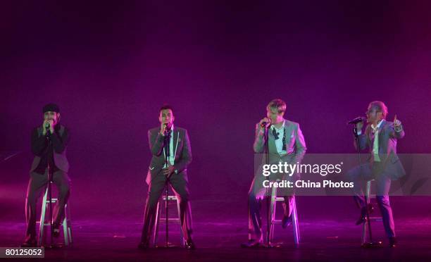 Members of US vocal group Backstreet Boys , Alexander James McLean, Howard Dwaine Dorough, Nickolas Gene Carter, Brian Littrell, perform at a concert...