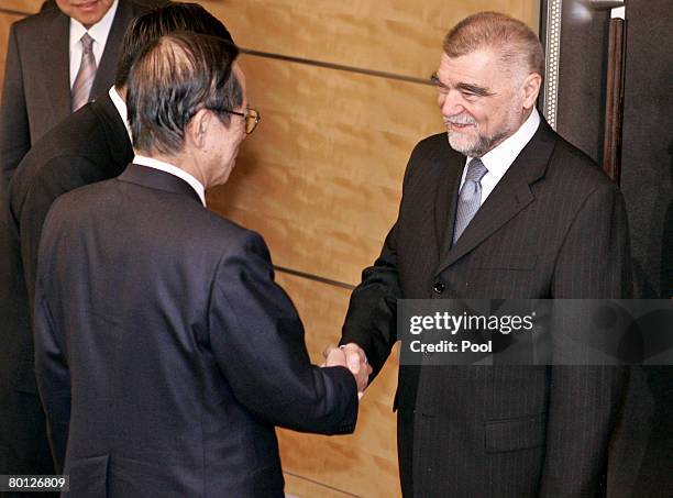 Croatian President Stjepan Mesic is greeted by Japanese Prime Minister Yasuo Fukuda prior to their talks at Fukuda's office March 5, 2008 in Tokyo,...