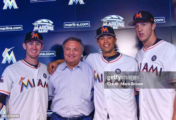 The Miami Marlins top three draft picks Brian Miller, Joe Dunand, and Trevor Rogers with Miami Marlins owner Jeffrey Loria visit Marlins Park for a...