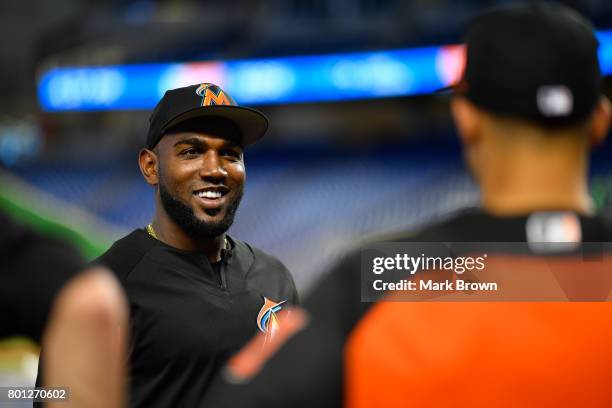 Marcell Ozuna of the Miami Marlins visits with the Miami Marlins top three draft picks Trevor Rogers, Brian Miller, and Joe Dunand visit Marlins Park...