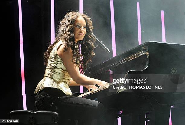 Singer Alicia Keys performs onstage at the ?Festhalle? in the central German city of Frankfurt/M. On March 4, 2008. Keys continued her tour to...