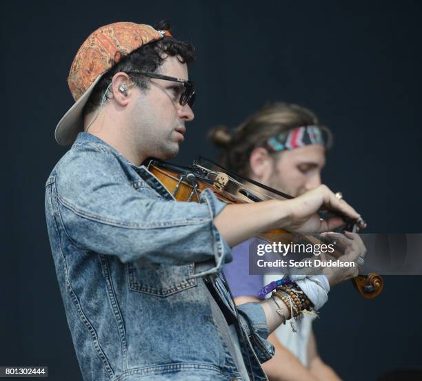 Musician Zambricki Li of Magic Giant perform in the crowd during Arroyo Seco Weekend at Brookside Golf Course on June 25, 2017 in Pasadena,...
