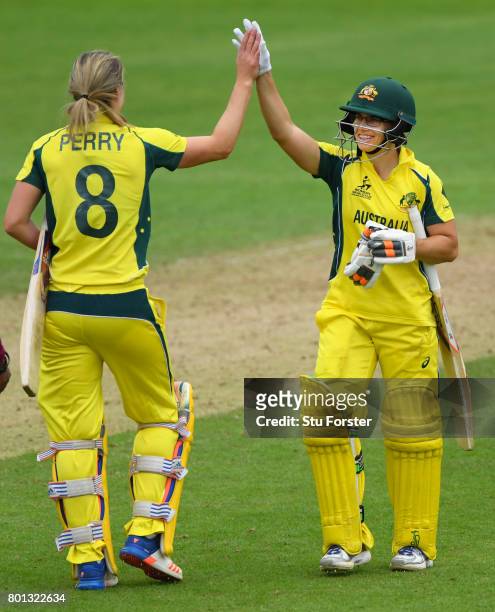 Australia batsman Nicole Bolton and Ellyse Perry celebrate victory during the ICC Women's World Cup 2017 match between Australia and West Indies at...