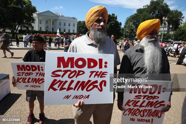 Members of Sikhs for Justice hold a "Punjab Independence Rally" in front of the White House on June 26, 2017 in Washington, DC. The rally was held...