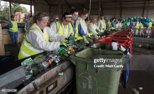 Collected rubbish and litter is processed at the Glastonbury Festival's purpose built Recycling Centre as festival goers leave the Glastonbury...