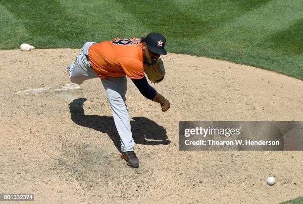 Dayan Diaz of the Houston Astros pitches against the Oakland Athletics in the bottom of the eighth inning at Oakland Alameda Coliseum on June 22,...