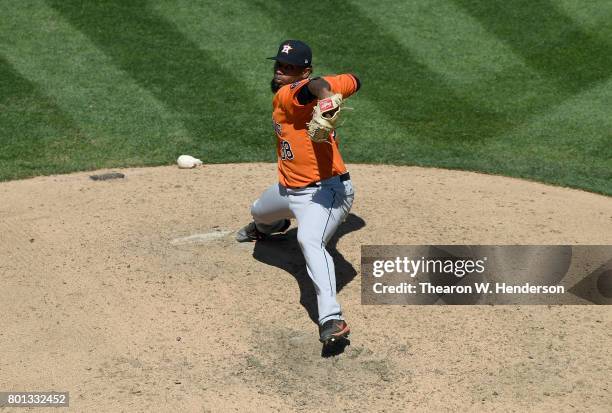 Dayan Diaz of the Houston Astros pitches against the Oakland Athletics in the bottom of the eighth inning at Oakland Alameda Coliseum on June 22,...