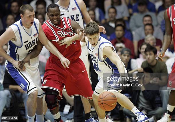 Jordan Davidson of the Duke Blue Devils moves for the ball against the St. John's Red Storm during the game at Cameron Indoor Stadium on February 23,...