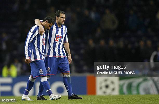 Porto players Ricardo Quaresma and Argentinian Mariano Gonzalez react at the end of the match against Schalke 04 at the Dragao stadium in Porto, on...