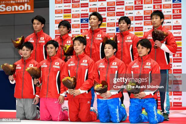 World Artistic Gymnastic Chamionships national team members Kohei Uchimura and Kenzo Shirai pose for photographs with national team candidates after...