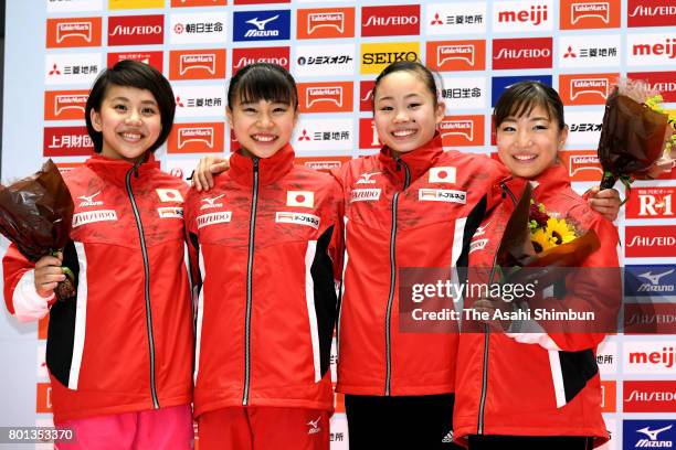 World Artistic Gymnastic Chamionships national team members Mai Murakami, Aiko Sugihara, Sae Miyazawa and Asuka Teramoto pose for photographs after...