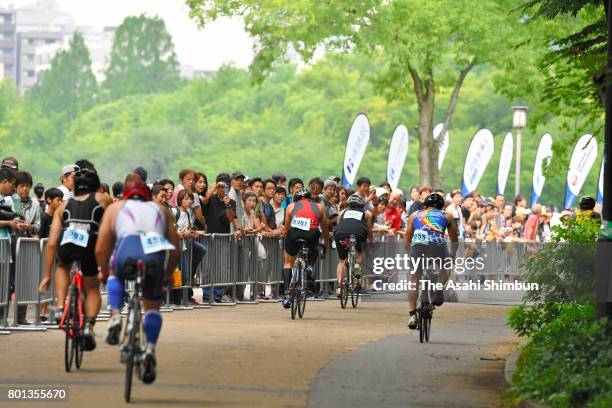 Participants compete in the bike of the Osaka Castle Triathlon on June 25, 2017 in Osaka, Japan.