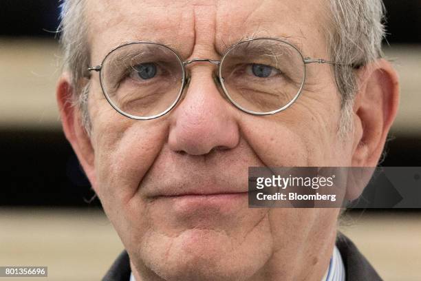 Pier Carlo Padoan, Italy's finance minister, poses for a photograph following a Bloomberg Television interview in Rome, Italy, on Monday, June 26,...