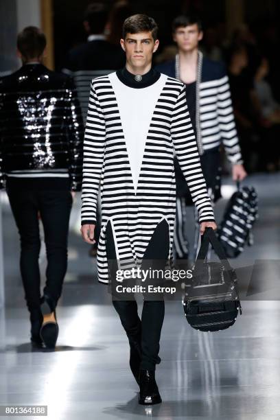 Model walks the runway during the Balmain Menswear Spring/Summer 2018 show as part of Paris Fashion Week on June 24, 2017 in Paris, France.