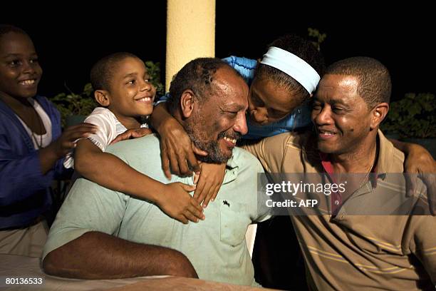 Released Colombian hostage Cesar Hoyos is huged by his family after arriving home on March 5, 2008 in Quibdo, Choco department, Colombia. Hoyos and...