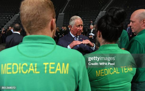 Prince Charles, Prince of Wales speaks with medical and security staff who helped the victims of the Manchester terror attack at Manchester Arena on...