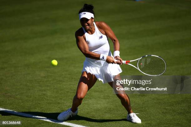 Heather Watson of Great Britain in action during her first round match against Dominika Cibulkova of Slovakia during day two of the Aegon...
