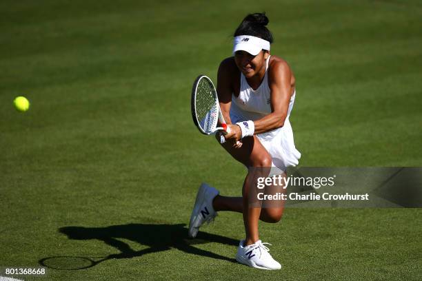 Heather Watson of Great Britain in action during her first round match against Dominika Cibulkova of Slovakia during day two of the Aegon...