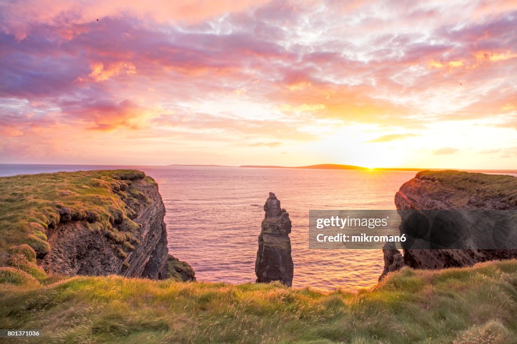 HQ Panorama of Ballybunion Cliff at colorfull sunset Co. Kerry, Ireland