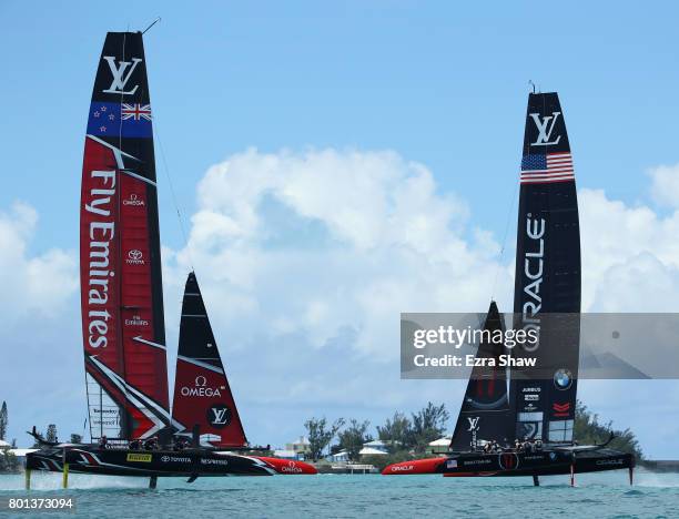 Emirates Team New Zealand helmed by Peter Burling and Oracle Team USA skippered by Jimmy Spithill compete during day 5 of the America's Cup Match...