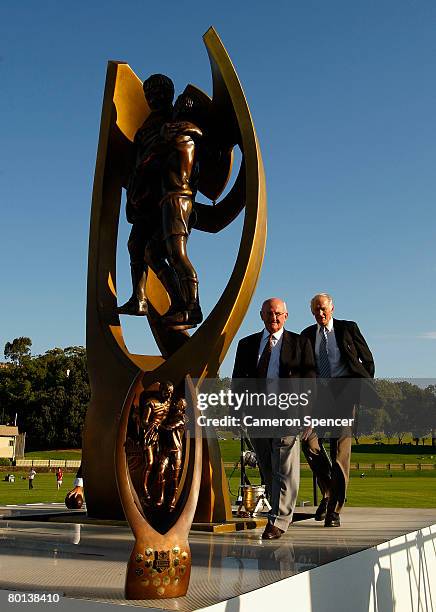 Rugby league legends Authur Summons and Norm Provan walk onto stage by the premiership trophy during the NRL 2008 season launch at Birchgrove Oval on...