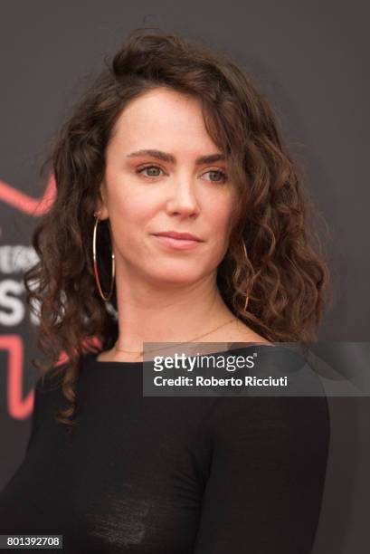 Actress Amy Manson attends a photocall for the World Premiere of 'Edie' during the 71st Edinburgh International Film Festival at Cineworld on June...