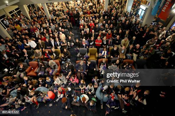 Team New Zealand supporters watch the racing at the Royal New Zealand Yacht Squadron as Team New Zealand win the Americas Cup over Oracle on June 27,...