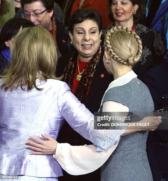 Palestinian Legislative Council member Hanan Ashrawi talks with European Commissioner for External Affairs Benita Ferrero-Waldner and Ukrainian Prime...