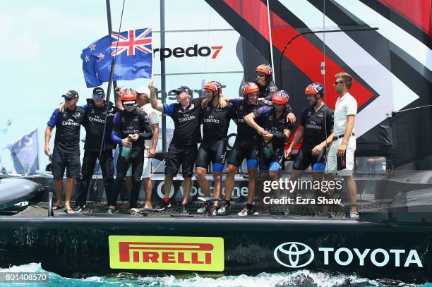 Emirates Team New Zealand helmed by Peter Burling celebrate after winning the America's Cup Match Presented by Louis Vuitton on June 26, 2017 in...