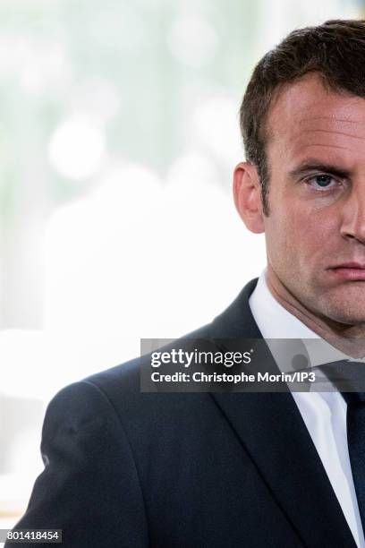 French President Emmanuel Macron receives Ukrainian President Petro Porochenko for a meeting and a press conference at the Elysee Palace on June 26,...