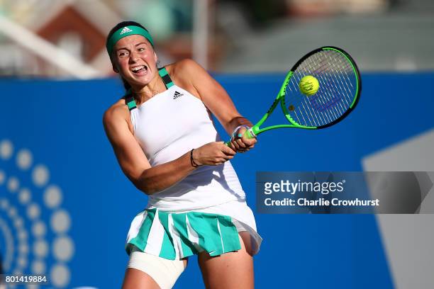 Jelena Ostapenko of Latvia in action during her first round match against Carla Suarez Navarro of Spain during day two of the Aegon International...