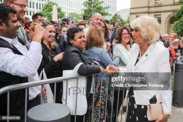 Camilla, Duchess of Cornwall greets memebers of the public after a reception in Manchester Town Hall to thank those involved during the Manchester...