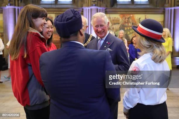 Prince Charles, Prince of Wales attend a reception in Manchester Town Hall to thank those involved during the Manchester Attack on June 26, 2017 in...
