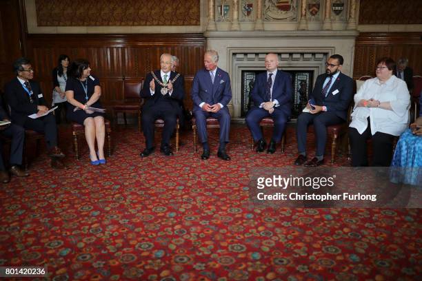 Prince Charles, Prince of Wales attend a roundtable discussion with community leaders and young people, Manchester Town Hall, about the impact of the...