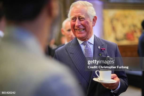 Prince Charles, Prince of Wales attend a reception in Manchester Town Hall to thank those involved during the Manchester Attack on June 26, 2017 in...