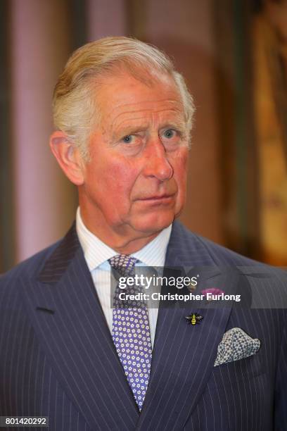 Prince Charles, Prince of Wales attend a reception in Manchester Town Hall to thank those involved during the Manchester Attack on June 26, 2017 in...