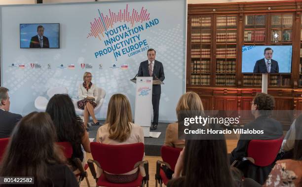 President Mario Draghi is accompanied by ECB Director General Communications Christine Graeff while having a conversation with students of selected...