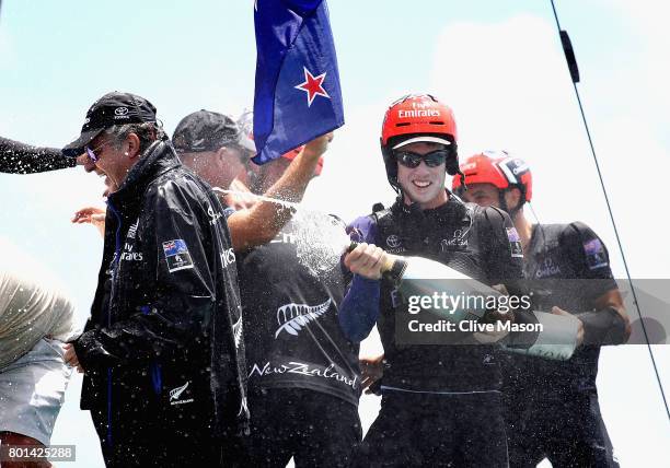 Peter Burling of Emirates Team New Zealand celebrates as they win race 9 against Oracle Team USA to win the America's Cup on day 5 of the America's...