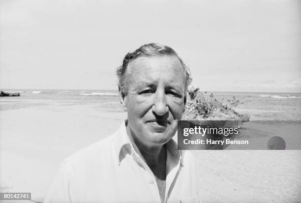 British novelist Ian Fleming on the beach near Goldeneye, his Jamaica home, 23rd February 1964.