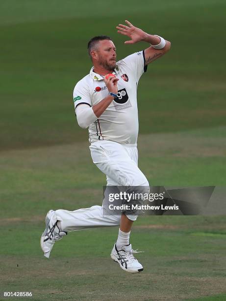 Mitchell Claydon of Kent in action during the Specsavers County Championship Division Two match between Nottinghamshire and Kent at Trent Bridge on...