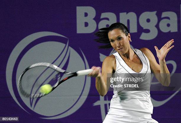 Serbian Tennis Player Jelena Jankovic plays a return during her match against Croatian Tennis player Sanda Mamic at the WTA Bangalore Open-2008 in...