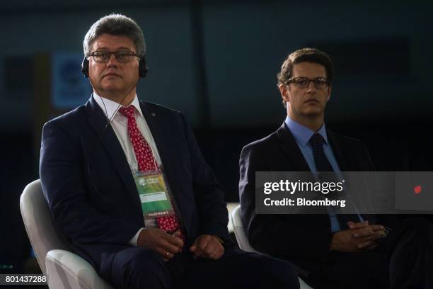 Remigijus Lapinskas, president of the World Bioenergy Association , left, listens during the UNICA Ethanol Summit 2017 in Sao Paulo, Brazil, on...