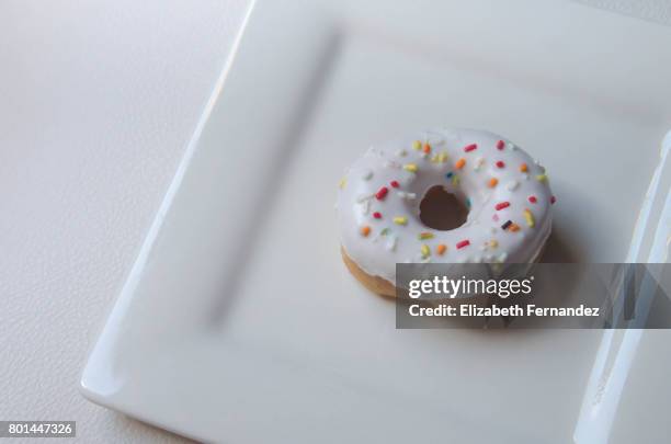 close-up of sprinkled mini donut - square plate stock pictures, royalty-free photos & images