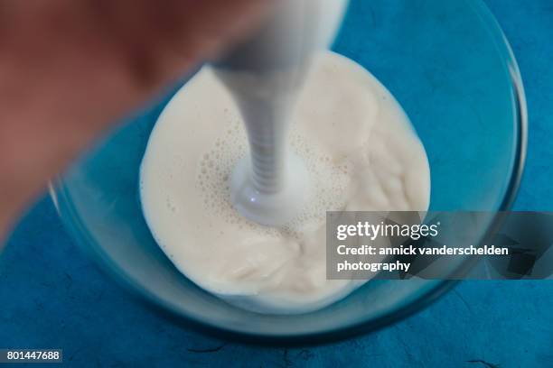 mixing almond milk. - almond milk stock pictures, royalty-free photos & images