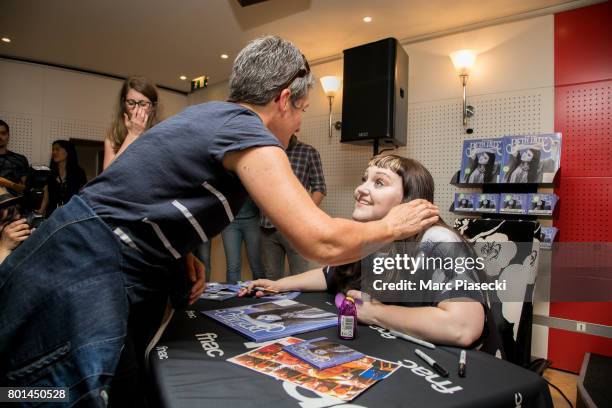 Singer Beth Ditto signs autographs after performing at FNAC Saint-Lazare on June 26, 2017 in Paris, France.