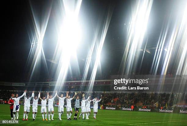 The players of Munich celebrate after winning the UEFA Cup Round of 16 first leg match between RSC Anderlecht and Bayern Munich at the Constant...