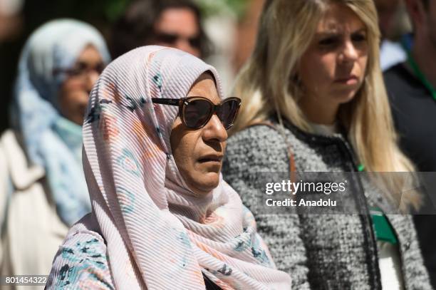 People stand in silence for the victims of the Finsbury Park terrorist attack outside Islington Town Hall in London, United Kingdom on June 26, 2017....