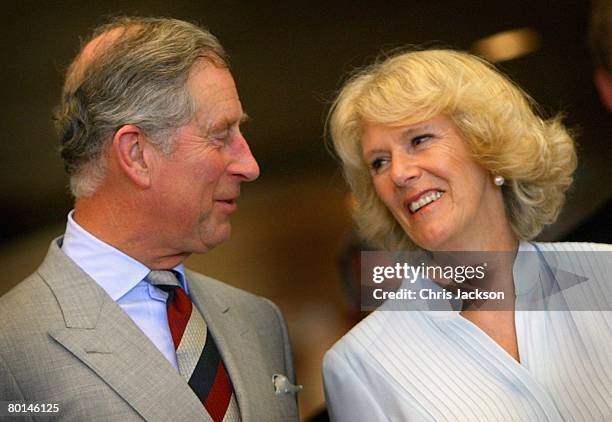 Prince Charles, The Prince of Wales and Camilla, Duchess of Cornwall smile as they watch traditional dancing at a reception for the Travel Foundation...